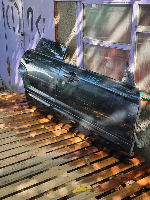 Двери на Subaru Forester Sg Sg  .