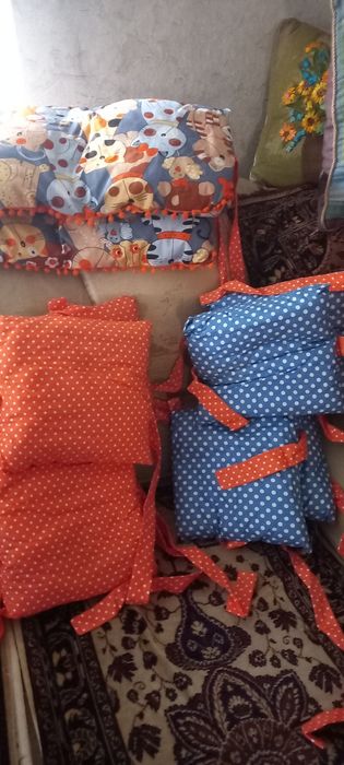 Бортики для детских кроваток