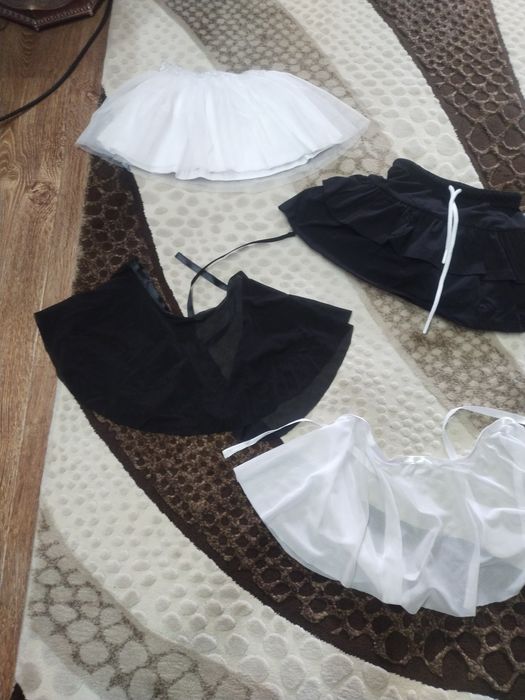 Продам гимнастическии купальники.    на девочку.