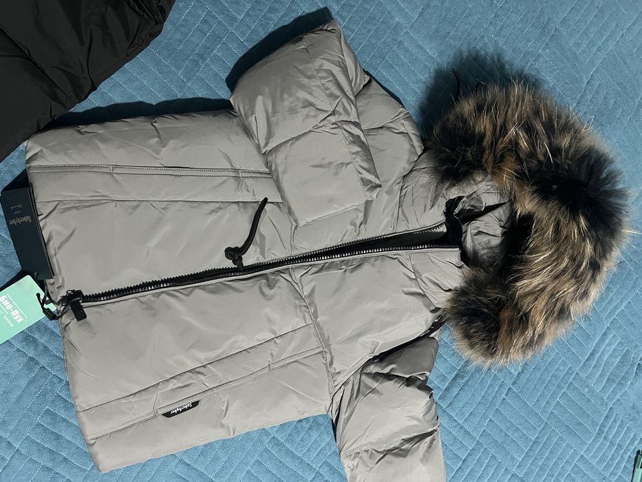 Продам новый зимний комбинезон
