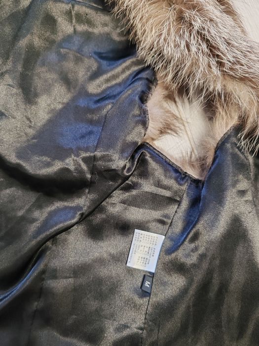 Продам жилетку с мехом