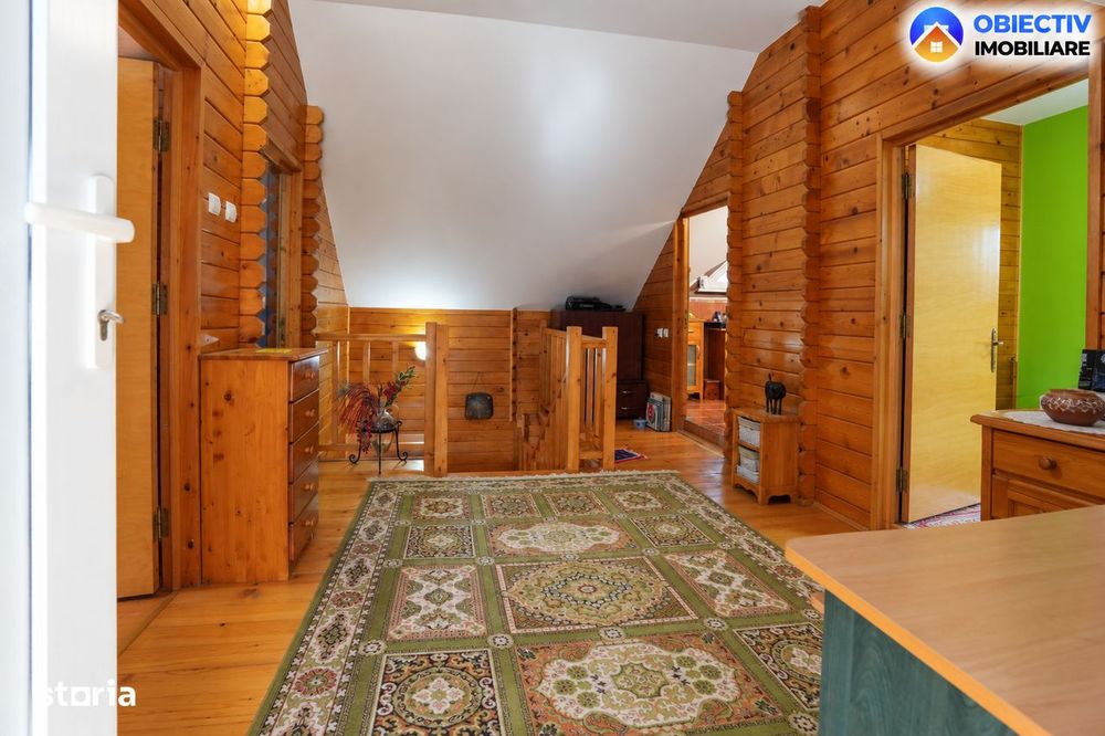 Casa din lemn P+M 191 mp, teren 2.199 mp, Almas - Garcina, zona retras