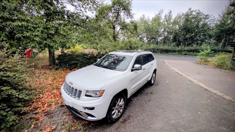 Vând Jeep Grand Cheroke summit 2014