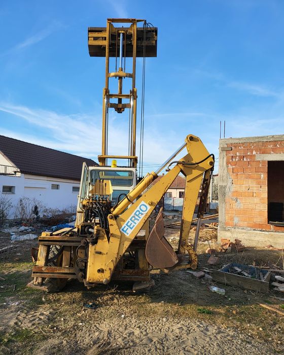 Buldoexcavator si manitou Buffalo Ferro