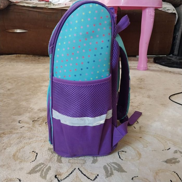 Продам рюкзак для девочки в школу .