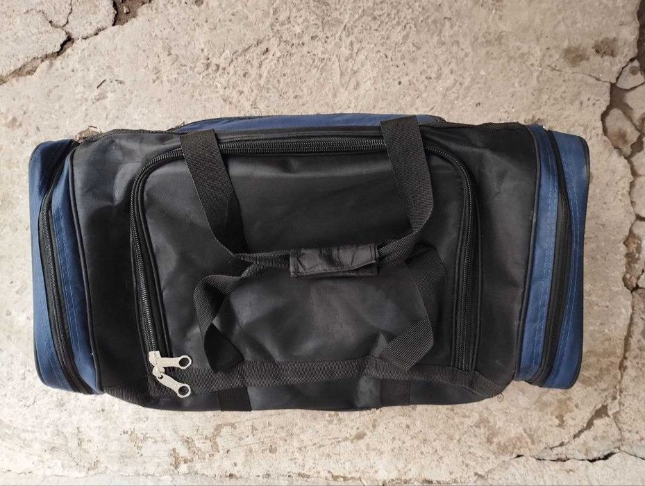 Сумка дорожная наручная новая марки Superdry