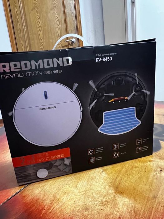 Продам НОВЫЙ робот пылесос Redmond