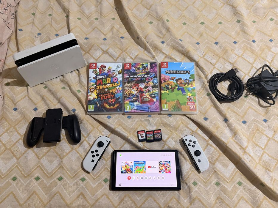 Nintendo switch oled с 3 игри става и бартер