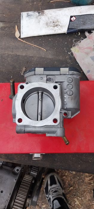 Продам дроссельную заслонку