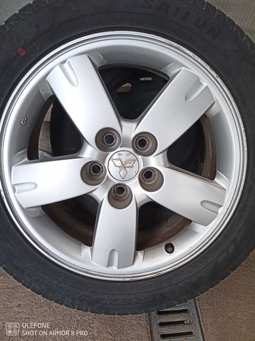 Джанти с гуми и гайки за Мицубиши аутлендур 17 цола