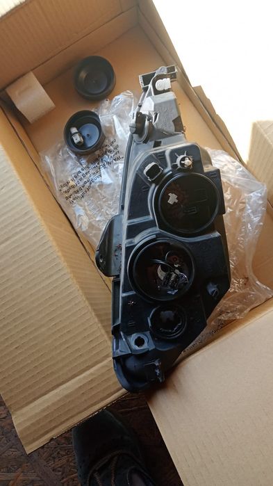 Far  stanga peugeot 206