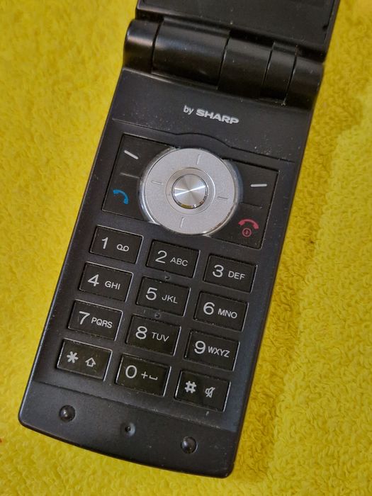 Telefon Sharp Gx29  fara încărcător.  Pret pentru colecție