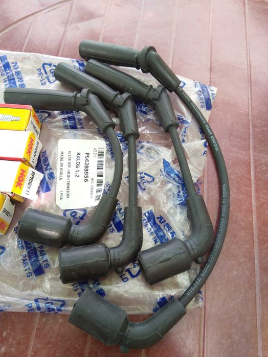 Кабели и свещи чисто нови за шевролет авео,калос до 2008г.