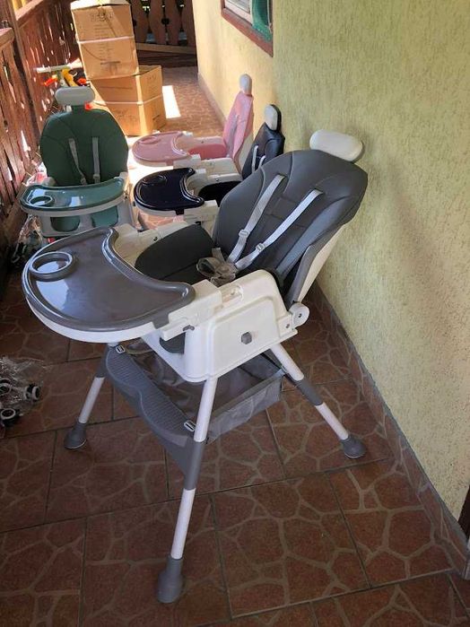 Scaun de masa bebe 4 in 1.Varsta 6-72 luni, Scaun inalt pliabil,4 roti silicon, 2 x Tava detasabila, Centura de siguranta in cinci puncte