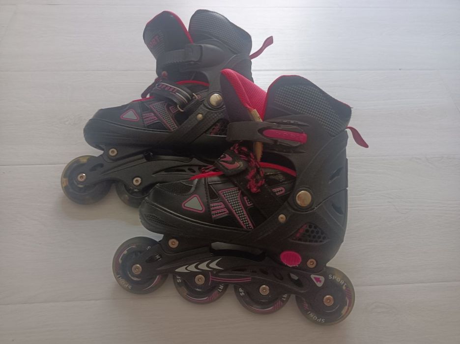 Роликовые коньки, детские, розовые.