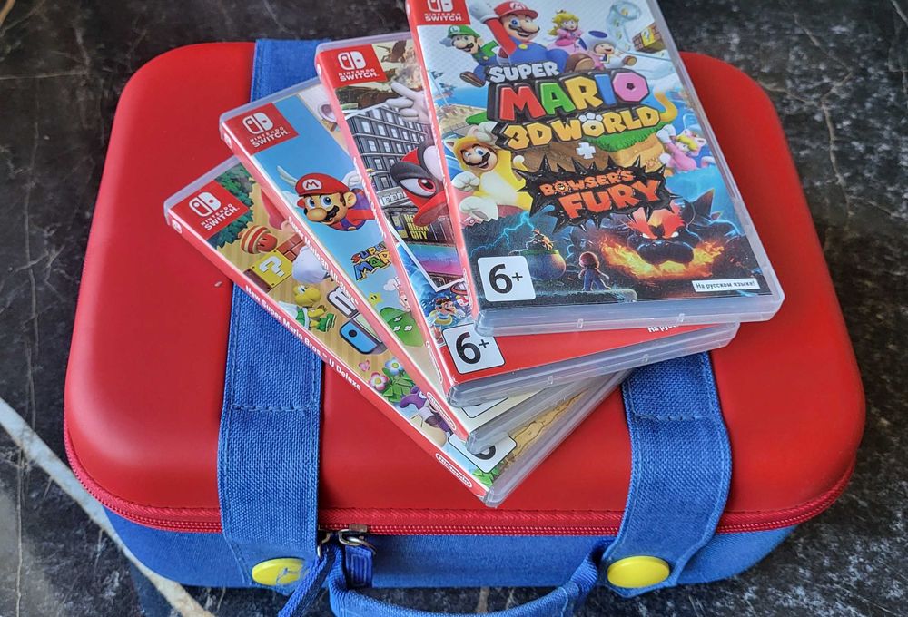 Игровая приставка Nintendo Switch с играми