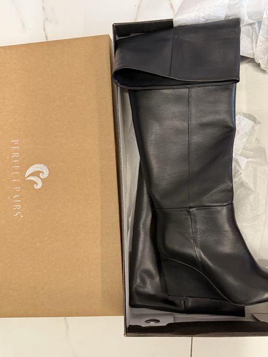 Продам новые сапоги