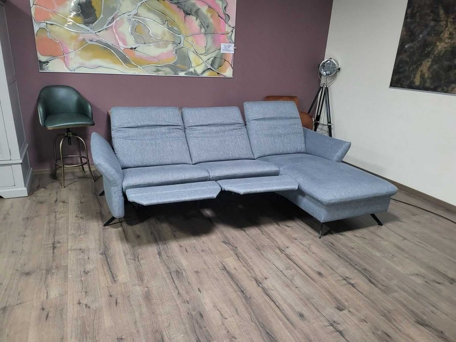 Сив ъглов диван от плат "HUKLA Interliving" с ел. релакс механизъм