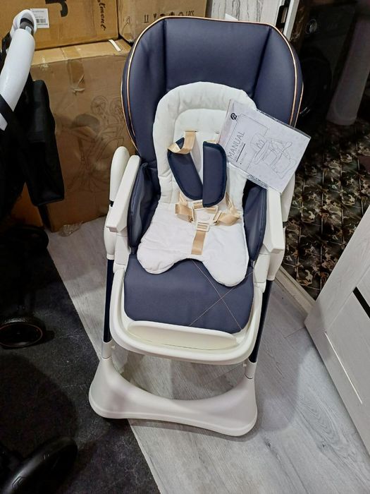 Продаётся фирменный кормление стульчик новый