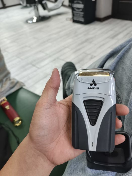 Триммер Andis новый.
