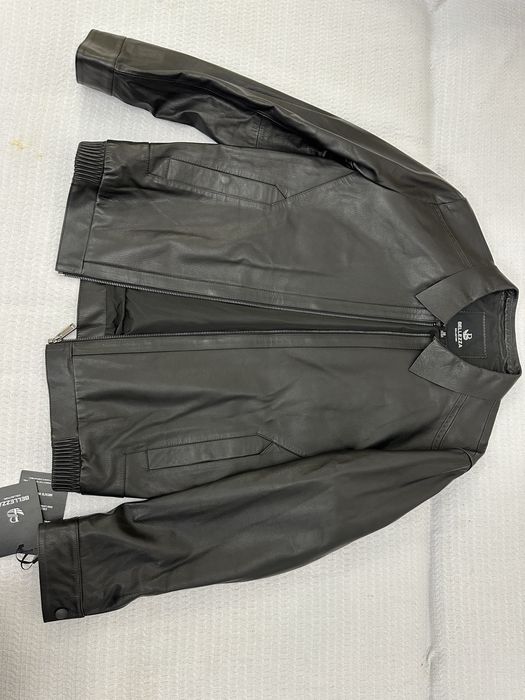 Продам мужскую кожаную куртку новую