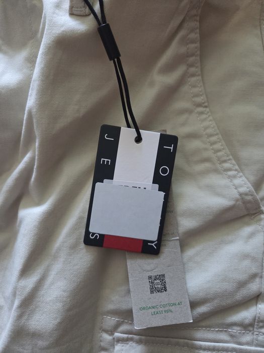 Tommy Jeans панталони Austin DM0DM18940 Бежов Slim Fit