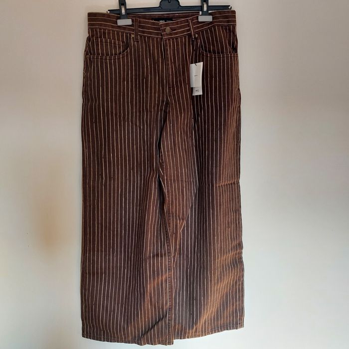 Pantaloni largi Mango cu dungi