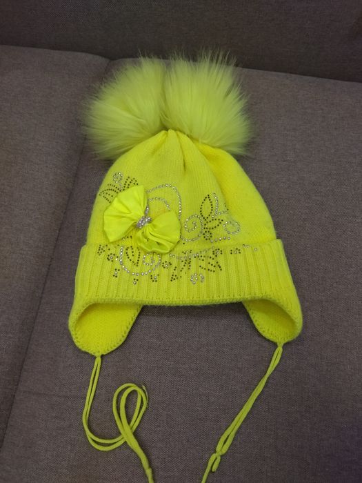 Продам     шапочки .