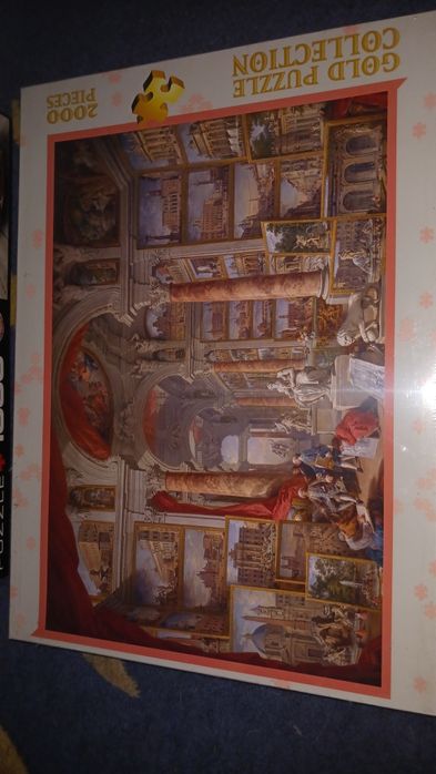 Vand 2 cutii puzzle mărimi  mari