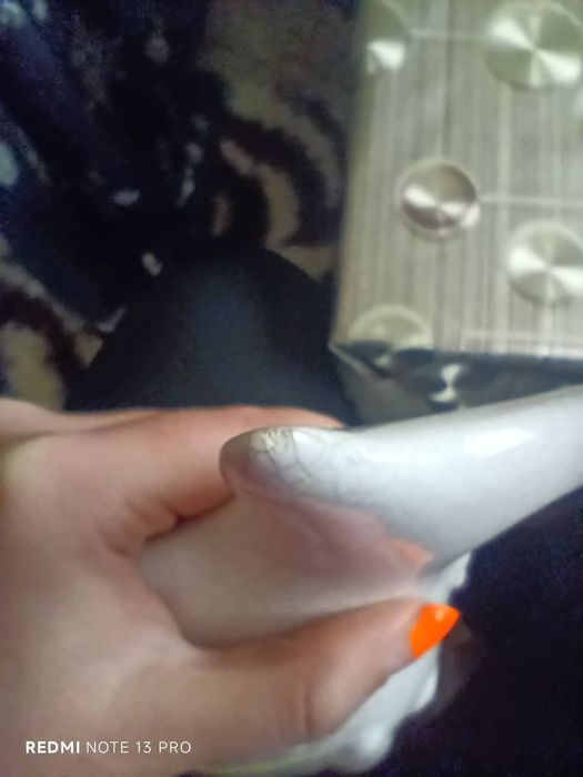 Стара статуетка на риба