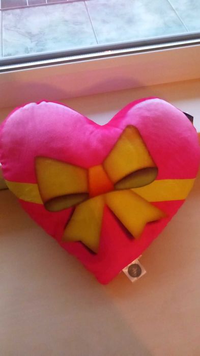 Розова възглавничка във формата на сърце