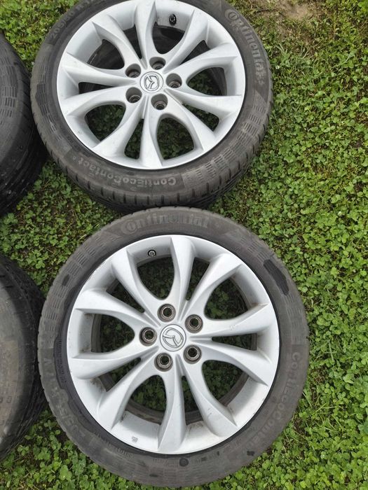 Set 4 jante originale Mazda R17 + anvelope Continental