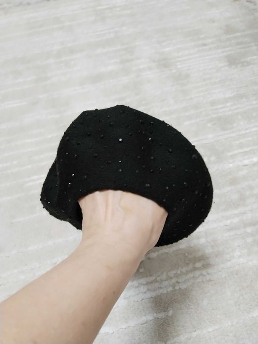 Продам вязанную шапку.