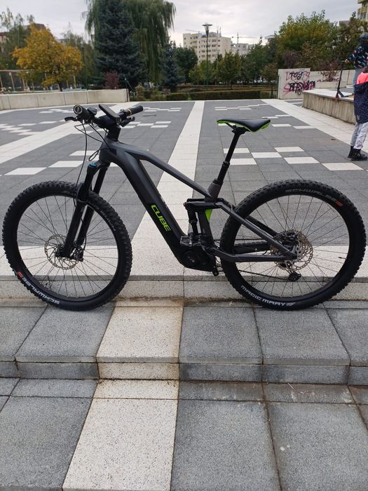 Vând bicicletă electrică full'suspension carbon CUBE