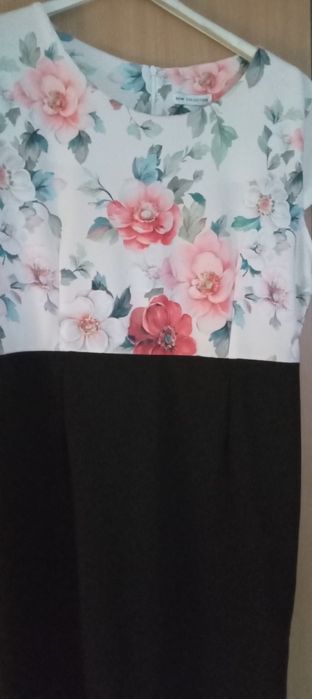 Rochie de ocazie culoare negru si partea, de sus cu imprimeu floral.,