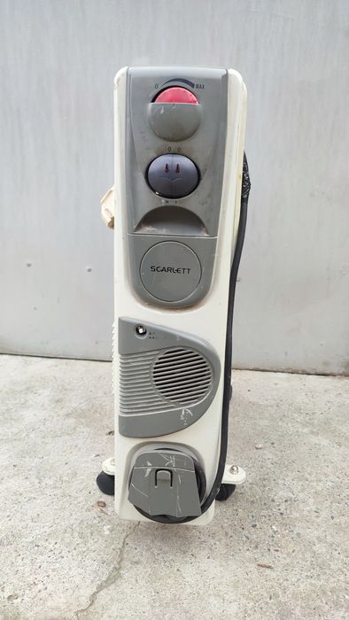 Масляный радиатор с вентилятором все работает.