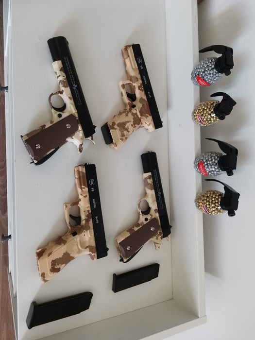 Pistol cu bile Glock Airsoft 6mm, bile plastic abs incluse 500buc, propulsie arc