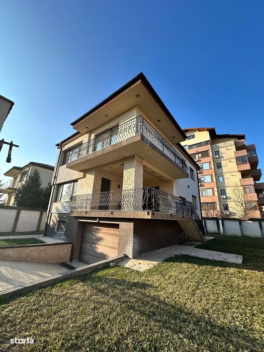 Casa individuala cu 5 camere, demisol cu garaj.