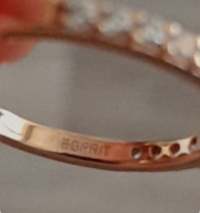 Пръстен Esprit проба 925 с розова позлата.