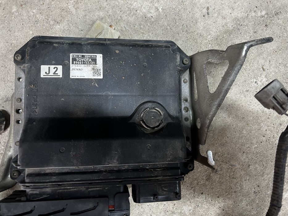 Компьютер двигателя J2 Toyota Corolla E150