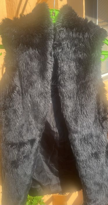 Дамски пухен елек