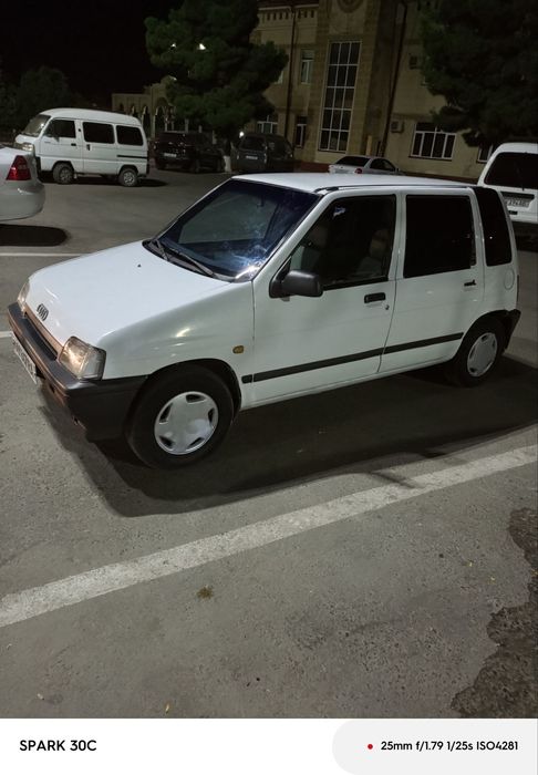 Tiko 1997 yil rangi oq