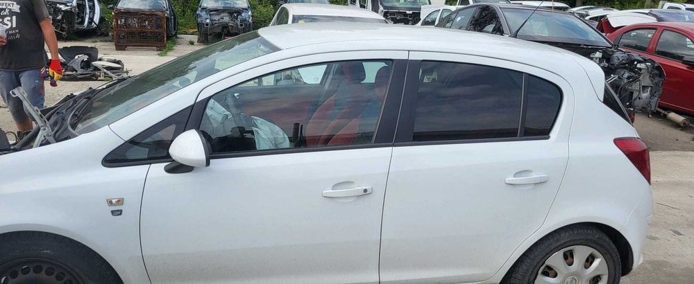 Usa stanga / dreapta spate Opel Corsa D  - Pret per bucata
