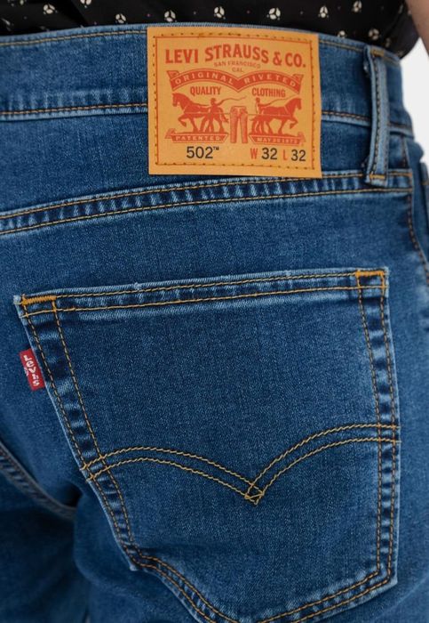Джинсы Levi's 502 taper fit р.34/32.
