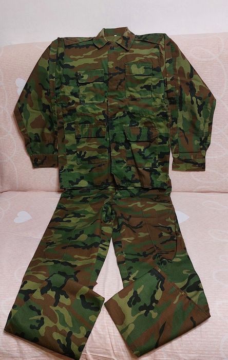 Камуфляж новый 44 размер.