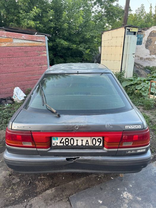 Машина Мазда 626