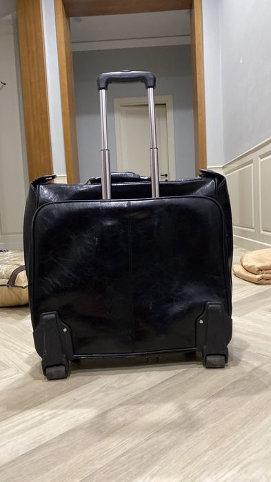 Дорожная кожаная сумка