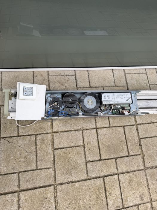 Usa de sticla glisanta cu motor Tormax