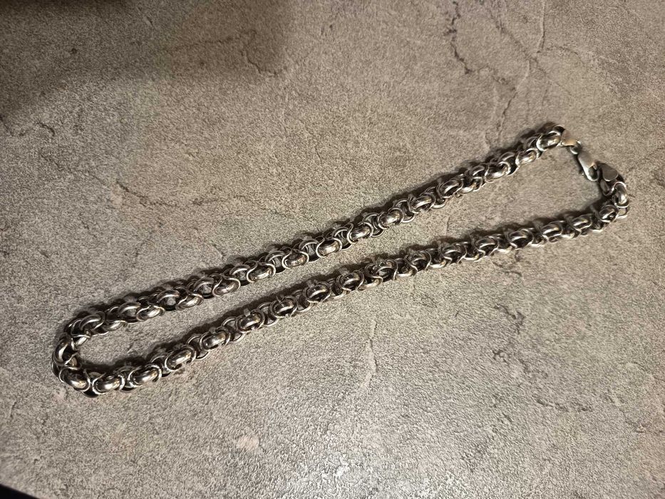 Сребърен мъжки ланец . Носен е малко. Дълъг е 51 см, 71 гр.