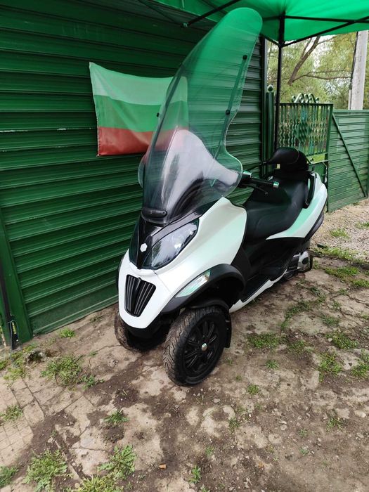 Пиаджо МП3 Piaggio MP3 300 кубика